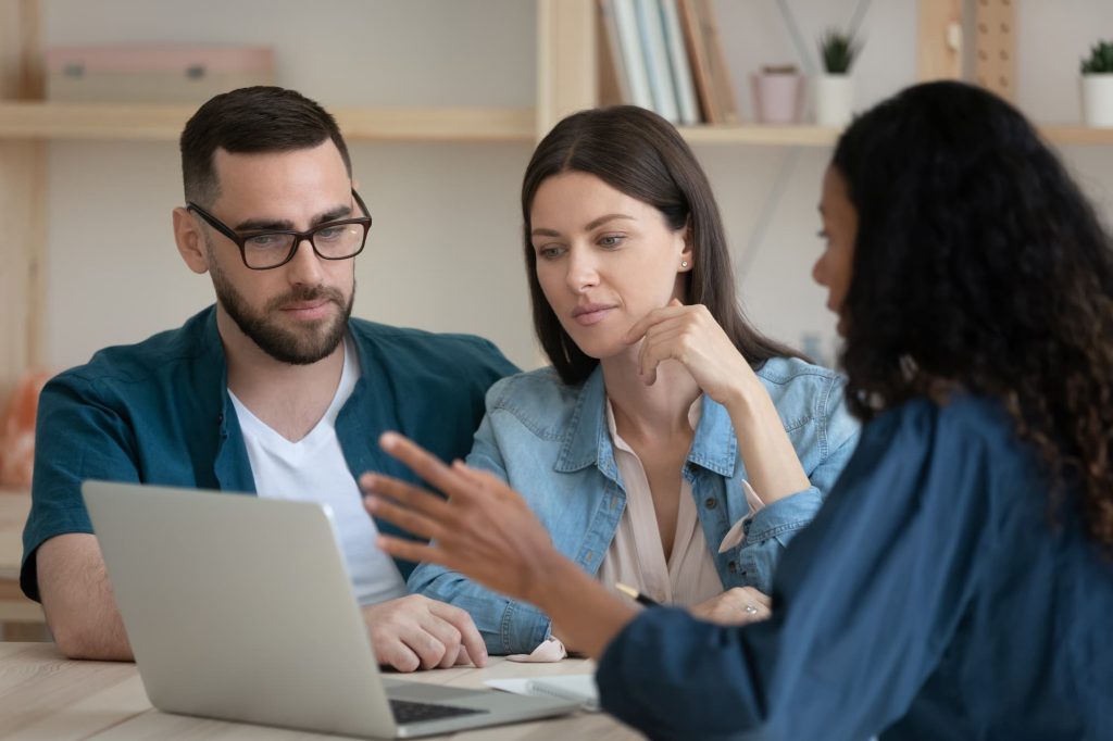 Couple looking at a computer